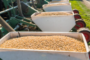 Farmer,With,Tractor,Seeding,-,Sowing,Soy,Crops,At,Agricultural